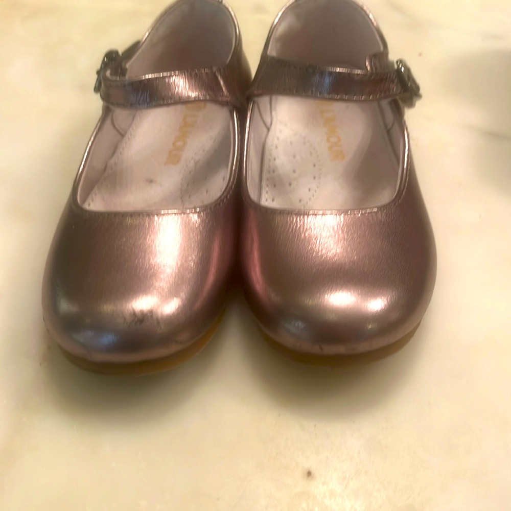 Worn once.  Few minor scratches. Size 10